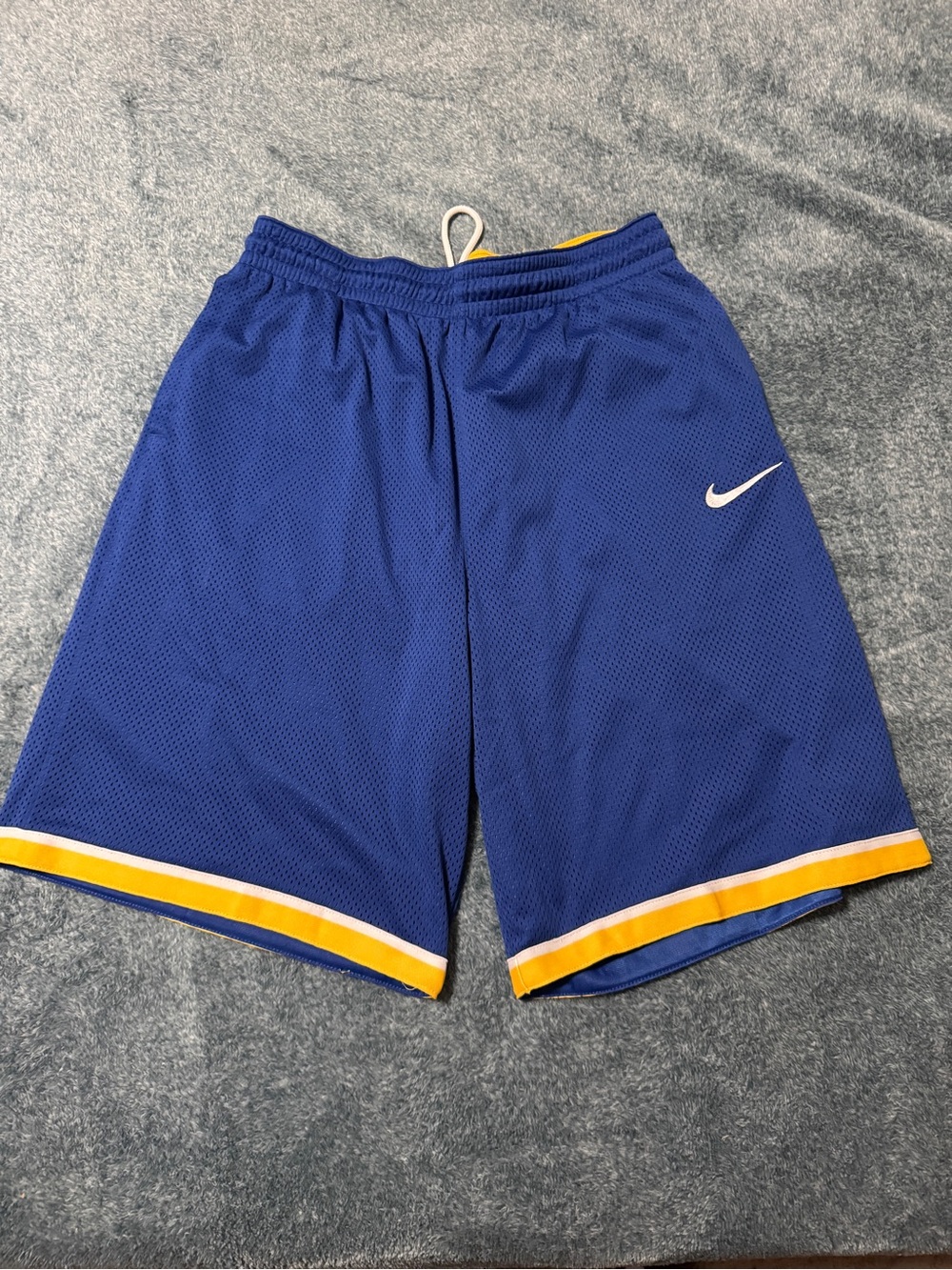 Nike Men's Royal Blue Athletic Mesh Shorts with Yellow Accent